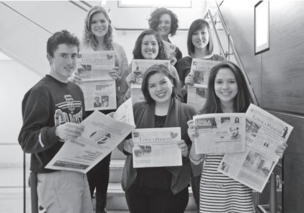 Students Pose With Issues Of The Loyola Phoenix · 150 Student Life