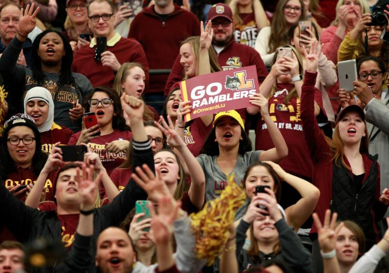 Crowd of students at a Loyola basketball game.