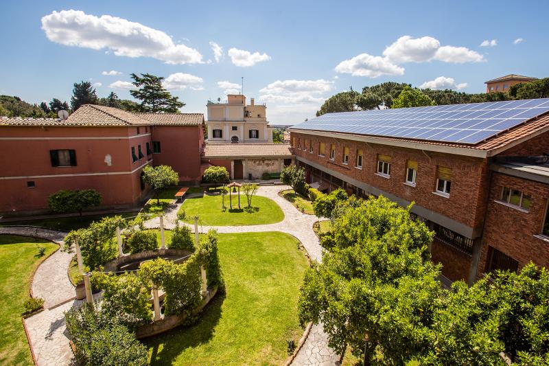 The courtyard and exterior of the John Felice Rome Center.