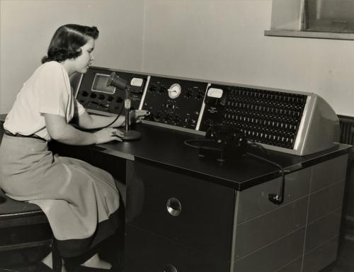 A Mundelein College student sits at the school's switchboard.