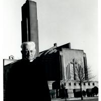 Father James Mertz, S.J. standing outside Madonna della Strada Chapel.