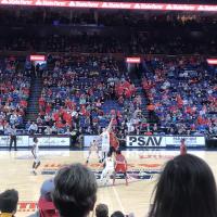 A stadium of fans watch as the ball is tipped off at the 2018 Arch Madness Championship game. 
